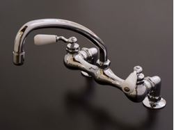 Picture of Strom Plumbing Deck Mount Kitchen Faucet with Arched Swivel Spout & Porcelain Lever Handles